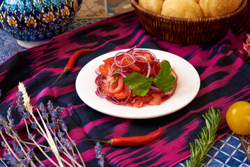 spicy salad of tomatoes, onions, and peppers. Oriental background