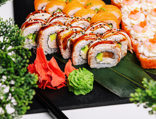 Fresh sushi traditional japanese food on big plate