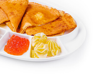 pancakes with red caviar and salmon and butter