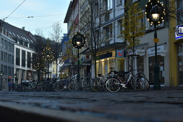 Evening Street View in Freiburg, Germany with Bicycles and Tram - 740066184