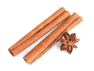 Cinnamon sticks and anise star isolated on white, above view