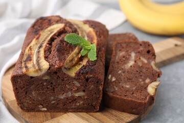 Delicious banana bread on grey table, closeup