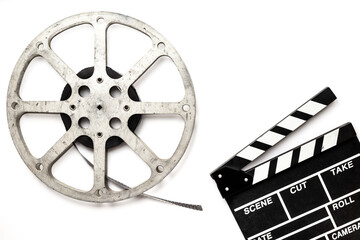 Film reels and clapperboard - cinema and filmmaker concept