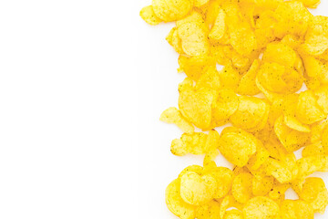 Snack background with crispy potato chips, top view