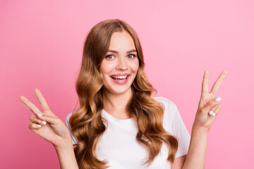 Photo of nice pretty positive woman with wavy hairstyle dressed white t-shirt showing v-sign symbol...