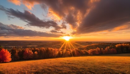 Colorful autumn sunset with sun rays coloring the clouds - obrazy, fototapety, plakaty