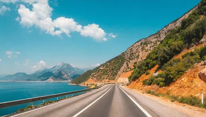 Foto op Canvas car driving on the road of Europe. road landscape in summer. it's nice to drive on the beachside highway. Highway view on the coast on the way to summer vacation. Turkey trip on beautiful travel road © Preston