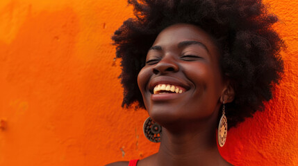 an African girl with dreadlocks and an orange background