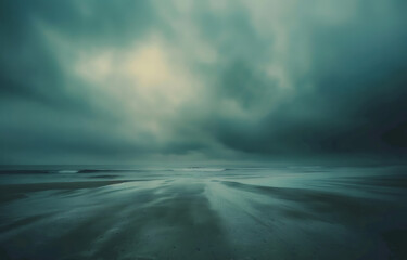a photo of an empty beach with light and dark clouds  - obrazy, fototapety, plakaty