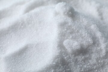 Organic white sea salt as background, closeup