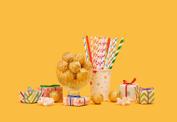 A variety of holiday gifts, cocktails and sweets. Colorful celebration design.