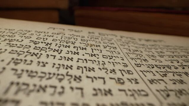Hebrew Bible. Exploring sacred jewish heritage scriptures. Revered texts in macro. Holy pages, old religious Torah book.