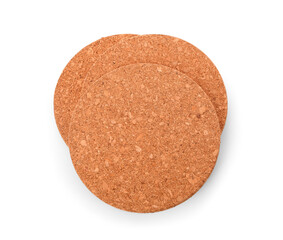 Round cork table coasters on white background