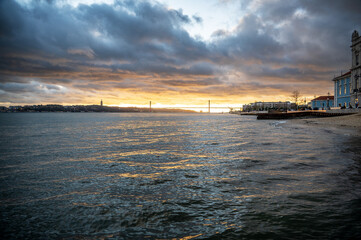 View of the Tagus River in Lisbon, Portugal with the 25 de Abril Bridge in the background
