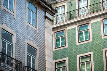 Fototapeta premium Historic buildings covered in blue and green azulejos in Lisbon, Portugal