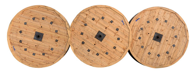 Wooden heavy cable reels, three vintage wood bobbins, electric fiber optic cables drums, electrical wires spools, steel wire cables industry large detailed isolated horizontal closeup white background - 740147588