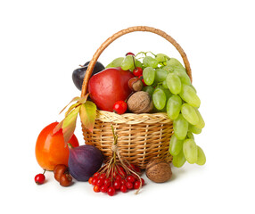 Wicker basket with different fresh fruits on white background