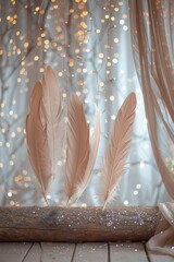 A wooden table sits by a window, adorned with delicate feathers, creating a unique and serene scene