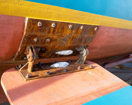 A zinc sacrificial anode on a marine vessel. The anode will dissolve protecting the iron from corrosion.