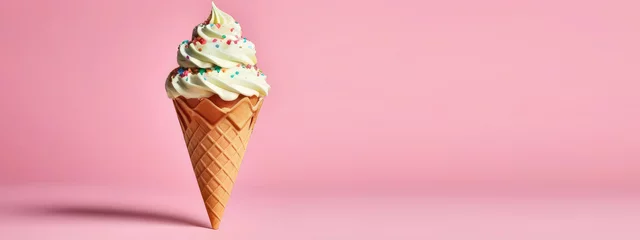 Foto auf Alu-Dibond Close-up of waffle cone with white ice cream and colored sprinkles. Ice cream on a pink background. Advertising banner concept. Copy space © Irina