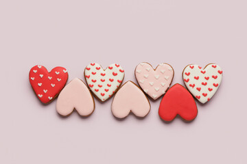 Many heart shaped cookies on lilac background. Valentine's day celebration