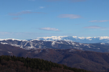 Fototapeta premium Winter landscape. Retreat of the snow. Mountain Thaw. Ponikva Macedonia 2023