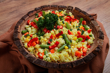 couscous with vegetables, paprika, carrots, string beans, corn, homemade, top view, no people,