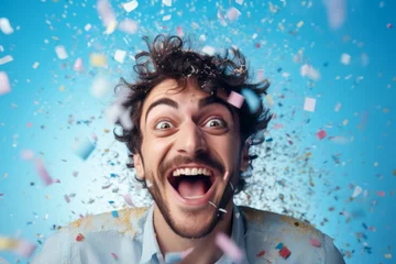 Foto op Plexiglas  Close-up photo of a mischievous grin on someone's face as they prepare a bucket of confetti for an April Fools' Day surprise, set against a soft pastel blue background © alexha