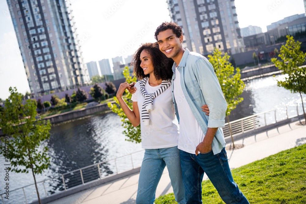 Canvas Prints profile portrait of positive peaceful partners cuddle enjoy pastime walk city center park river outs