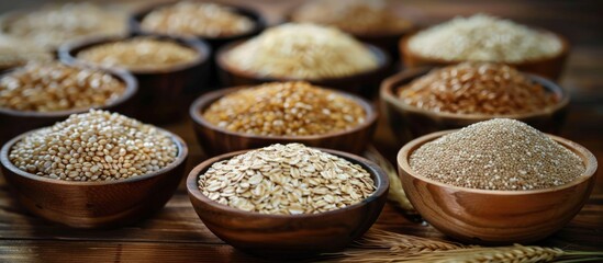 A nutritious diet for a healthy with variety of whole grains, brown rice, oats, and barley in bowls.
