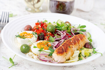 Breakfast homemade chicken sausage with boiled egg and fresh salad. Keto, ketogenic breakfast. Trendy breakfast.