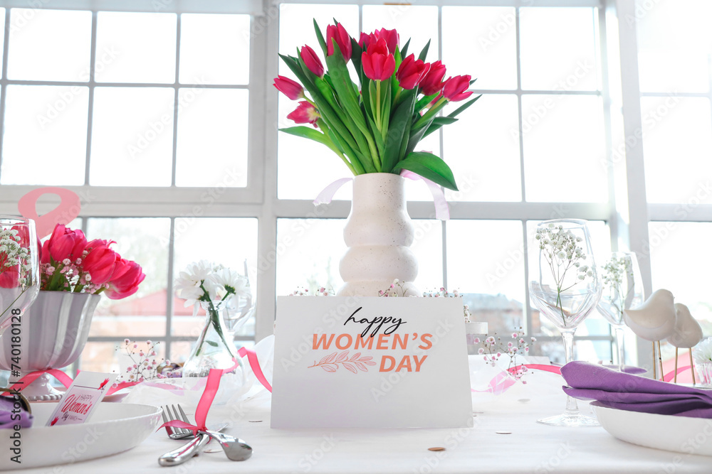 Sticker Elegant table setting with tulip flowers and greeting card for International Women's Day celebration