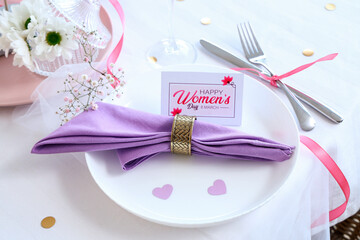 Stylish table setting for International Women's Day celebration, closeup