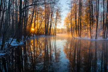frosty sunrise at the spring water lake