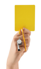 Referee holding yellow card and whistle on white background, closeup