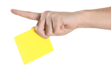 Referee holding yellow card and pointing on white background, closeup