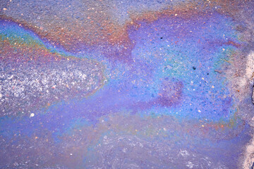 Multicolored abstract background of liquid water with oil and gasoline.