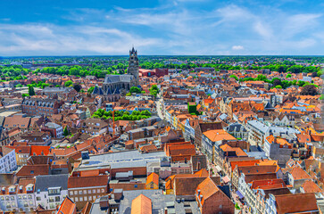 Bruges cityscape, aerial panoramic view of Bruges historic city centre, old buildings tiled roofs and Saint Salvator's Cathedral, skyline panorama of Brugge old town, West Flanders province, Belgium