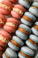 Duo of macaroons. Blue and beige together