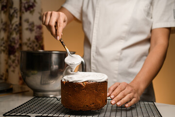 Whipped cream added to enhance Easter cakes top