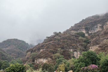 Landscape of the mountains of Malinalco, State of Mexico, with fog and rain.