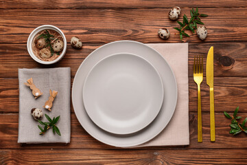 Traditional style Easter table setting on wooden background