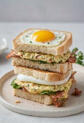 Stacked Breakfast Sandwich with Sunny Side Up Egg