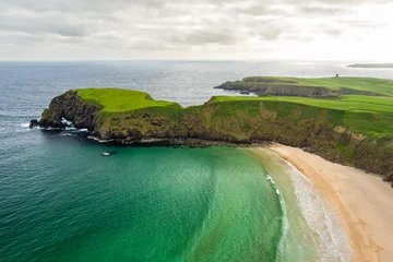  Silver Strand, a sandy beach in a sheltered, horseshoe-shaped bay, situated at Malin Beg, near Glencolmcille, in south-west County Donegal, Ireland © MNStudio