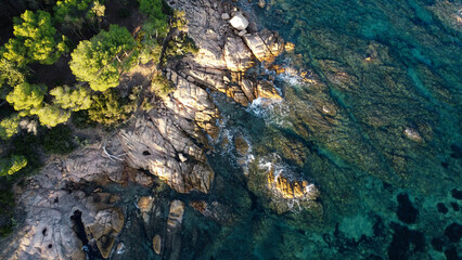 Beautiful aerial drone view of rocky Sardinian coast .