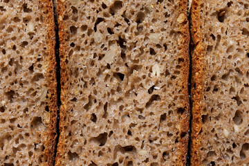 Sourdough rye bread cross section, macro. Bread background