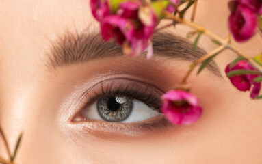 The make-up artist does Long-lasting styling of the eyebrows and makes the procedure of lamination...