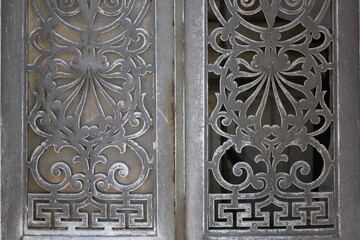 old ornamented metal fence texture
