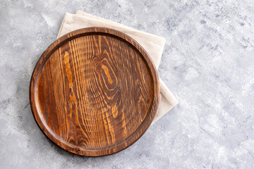 Cutting board over marble table background. Cooking backdrop. Top view with space for your recipe