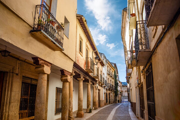 Fototapeta na wymiar View of the Calle Mayor of Alcaraz, Albacete, Castilla la Mancha, Spain towards the Plaza Monumental with its historic buildings